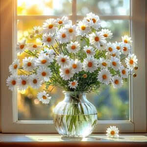 A bouquet of white daisies in a glass vase, placed on a windowsill.